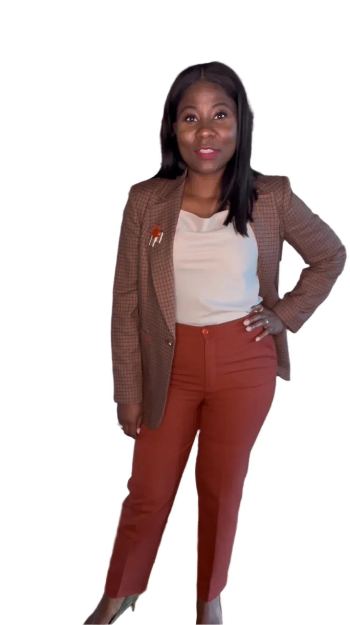 Lady is wearing a pant suit perfect for spring. 